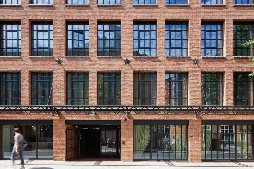 urban residential block with metal windows and doors and black frames