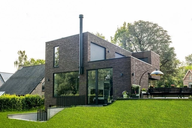modern house with external crittall doors and large garden windows