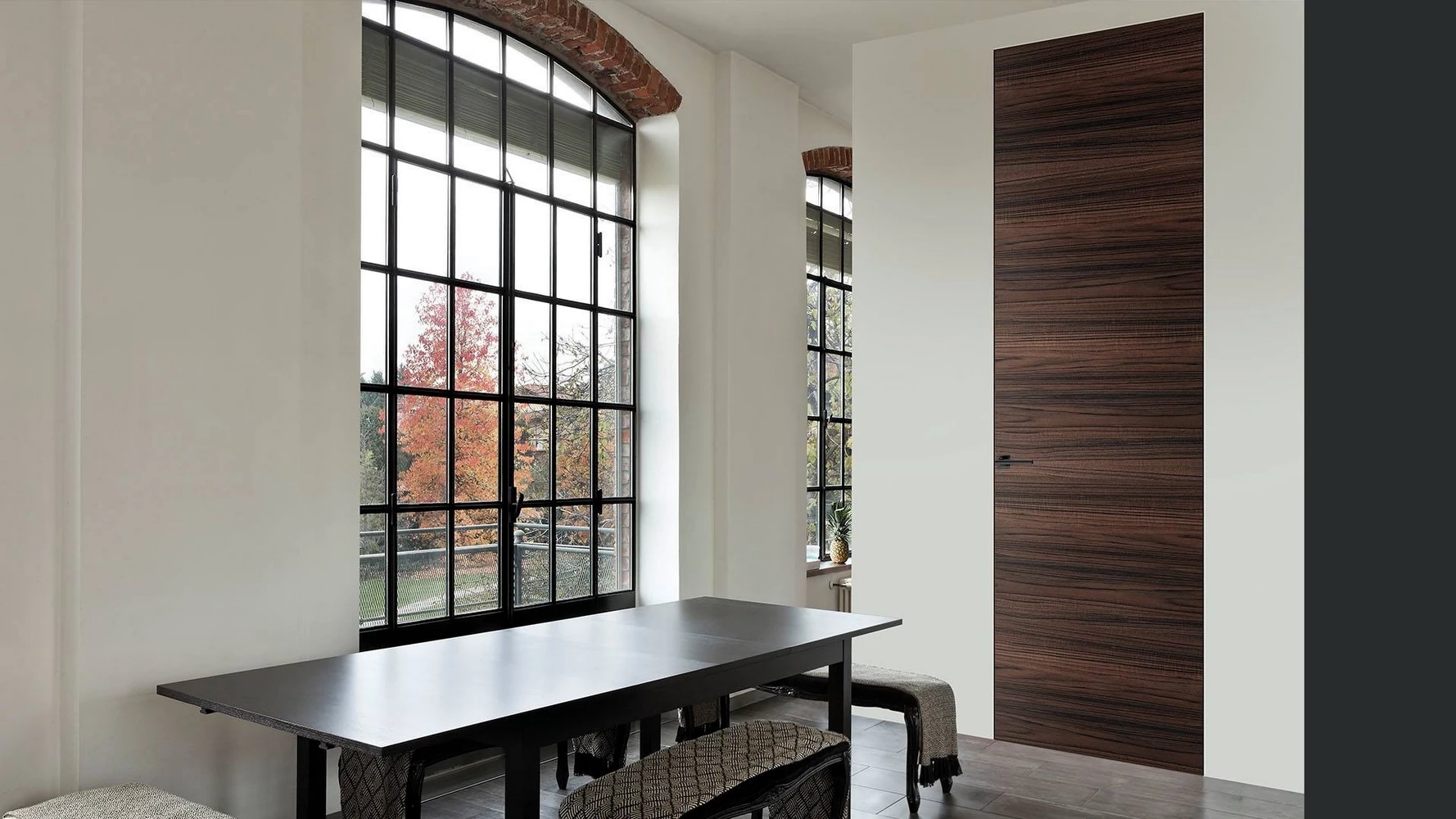 home office with metal windows and doors