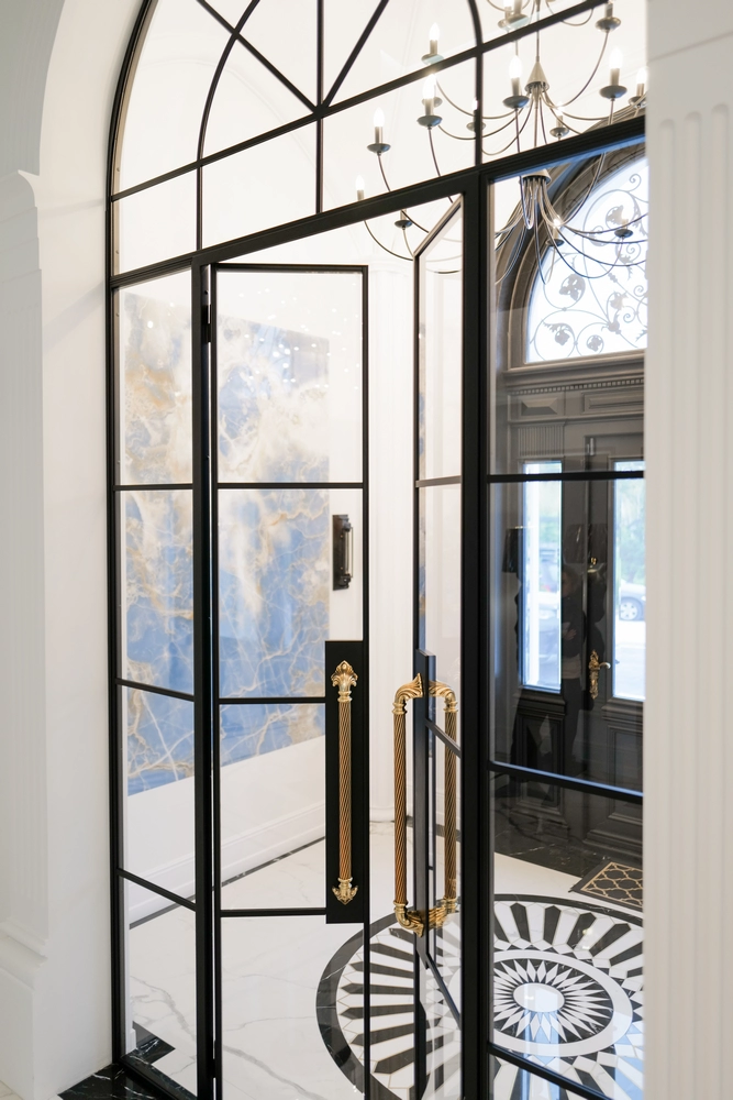 corridor with fire rated crittall doors and soft lighting