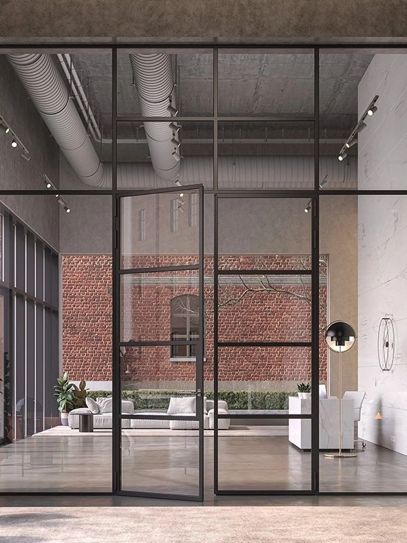 office lobby with metal doors and windows and exposed brick