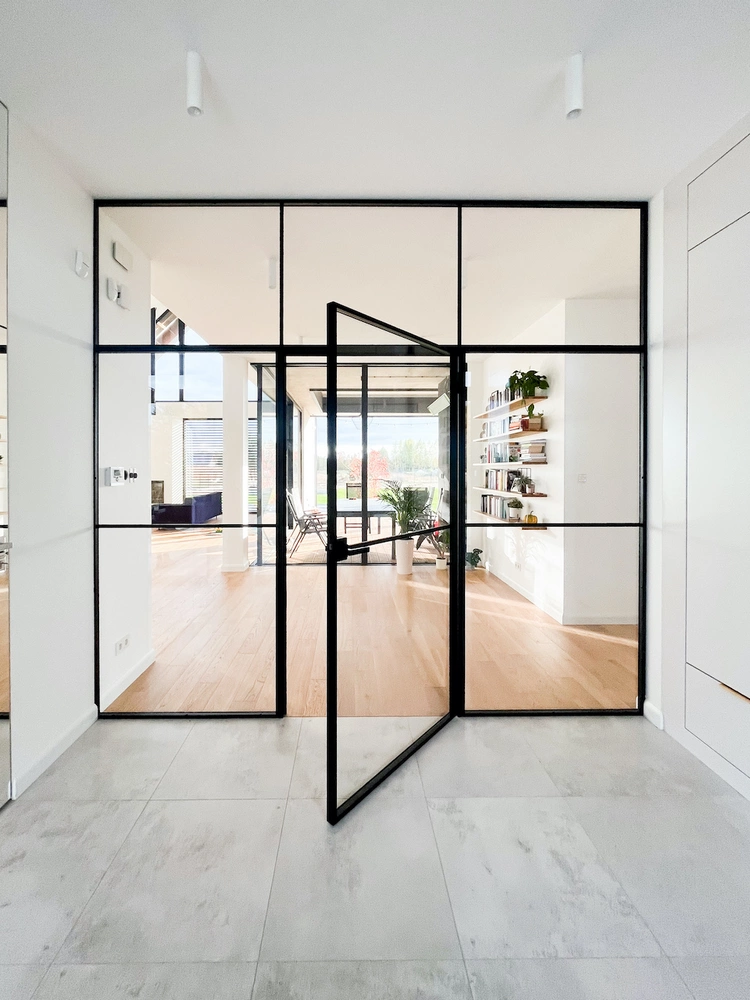 modern interior featuring crittall style bifold doors and a bright space
