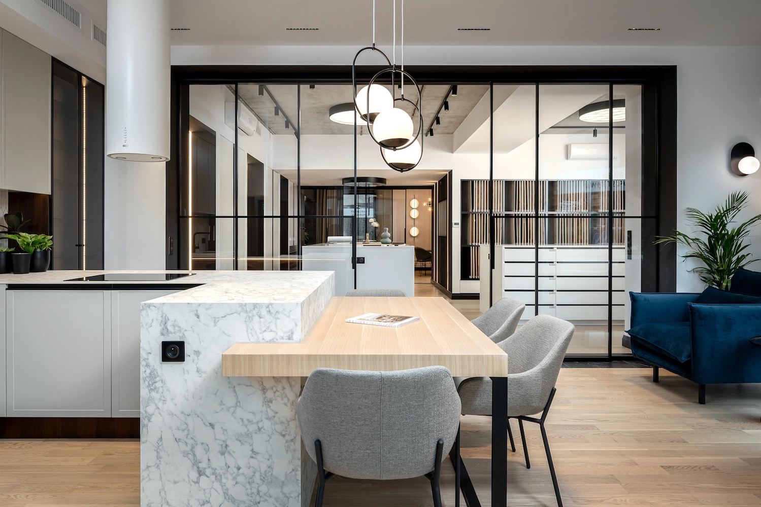 kitchen with crittall style internal doors and marble countertops
