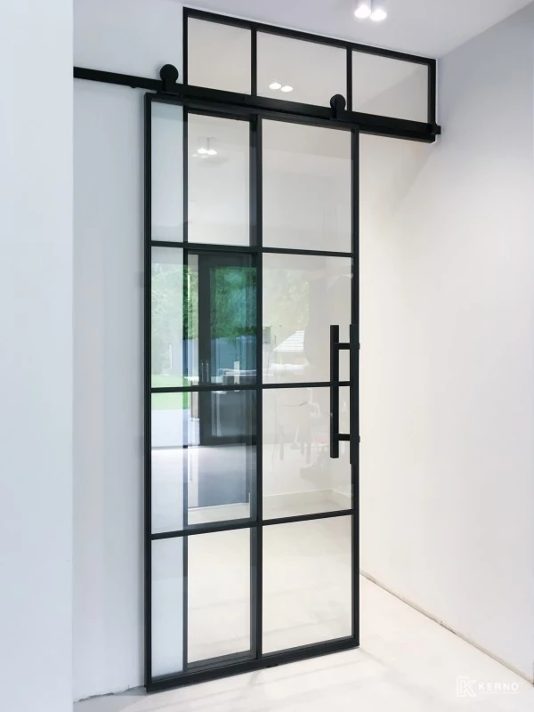 hallway featuring sliding steel crittall doors
